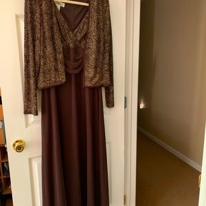 Beautiful sleeveless full length dress with long sleeve jacket. Never worn.